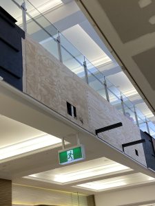 Warm and earthy aesthetic achieved in a retail space using plywood