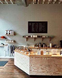 Warm and earthy aesthetic achieved in a retail space using plywood